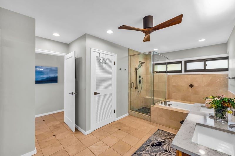The primary bath features a separate walk in shower and bath tub for ultimate relaxation KRV-311