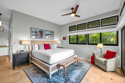Master bedroom with plush bedding KRV-311