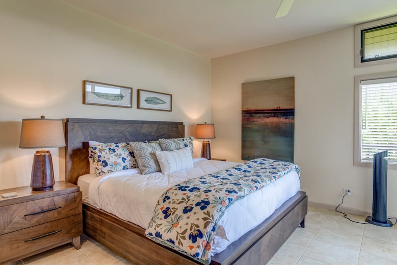 Wrap yourself in the cozy comfort of this tropically tranquil suite, where serenity is as abundant as the throw pillows KRV-722
