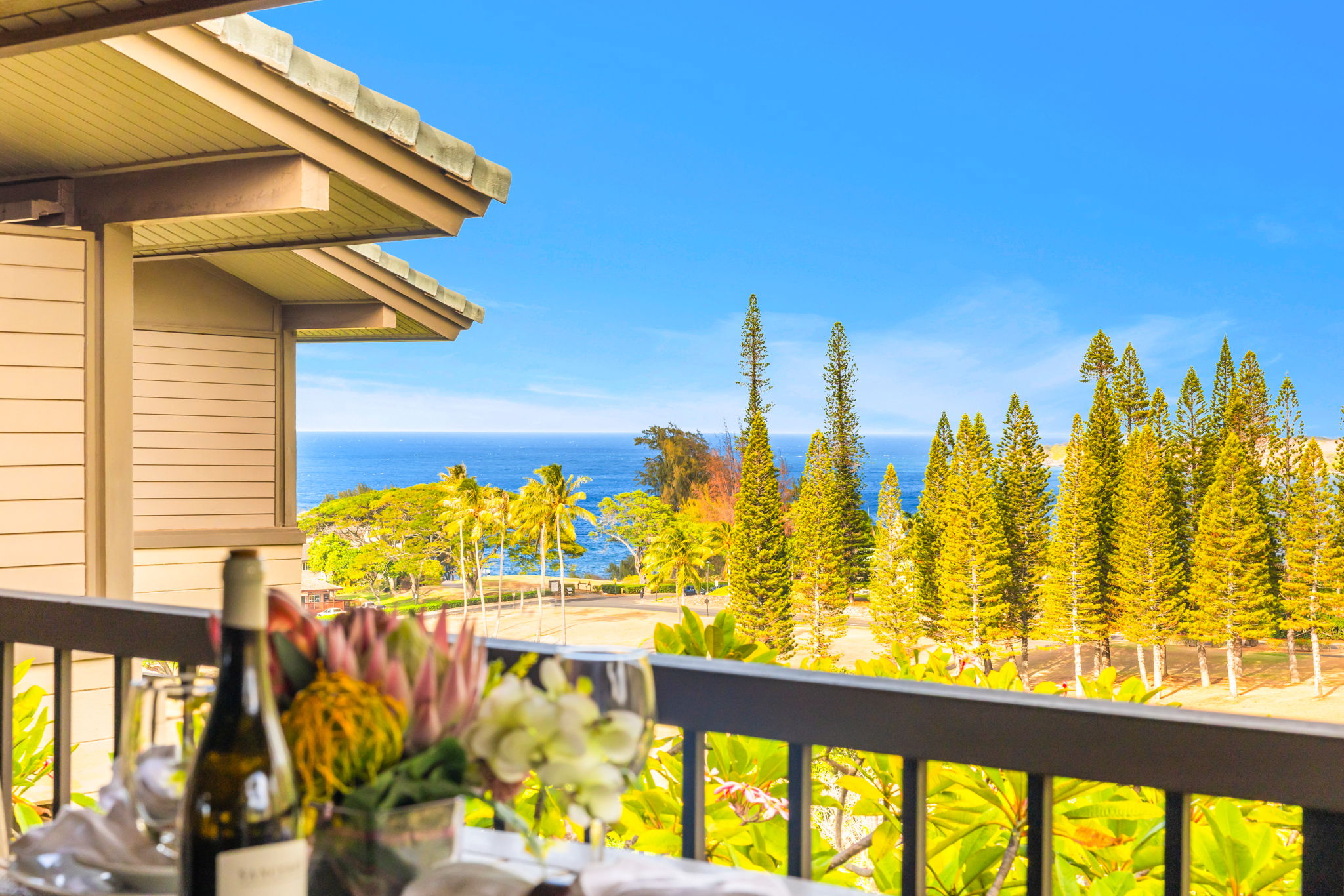 Gaze out over treetops and gardens from your lanai's elevated vantage point.