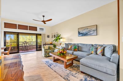Sofa sleeper and Smart TV make this open-plan living area perfect for movie nights.