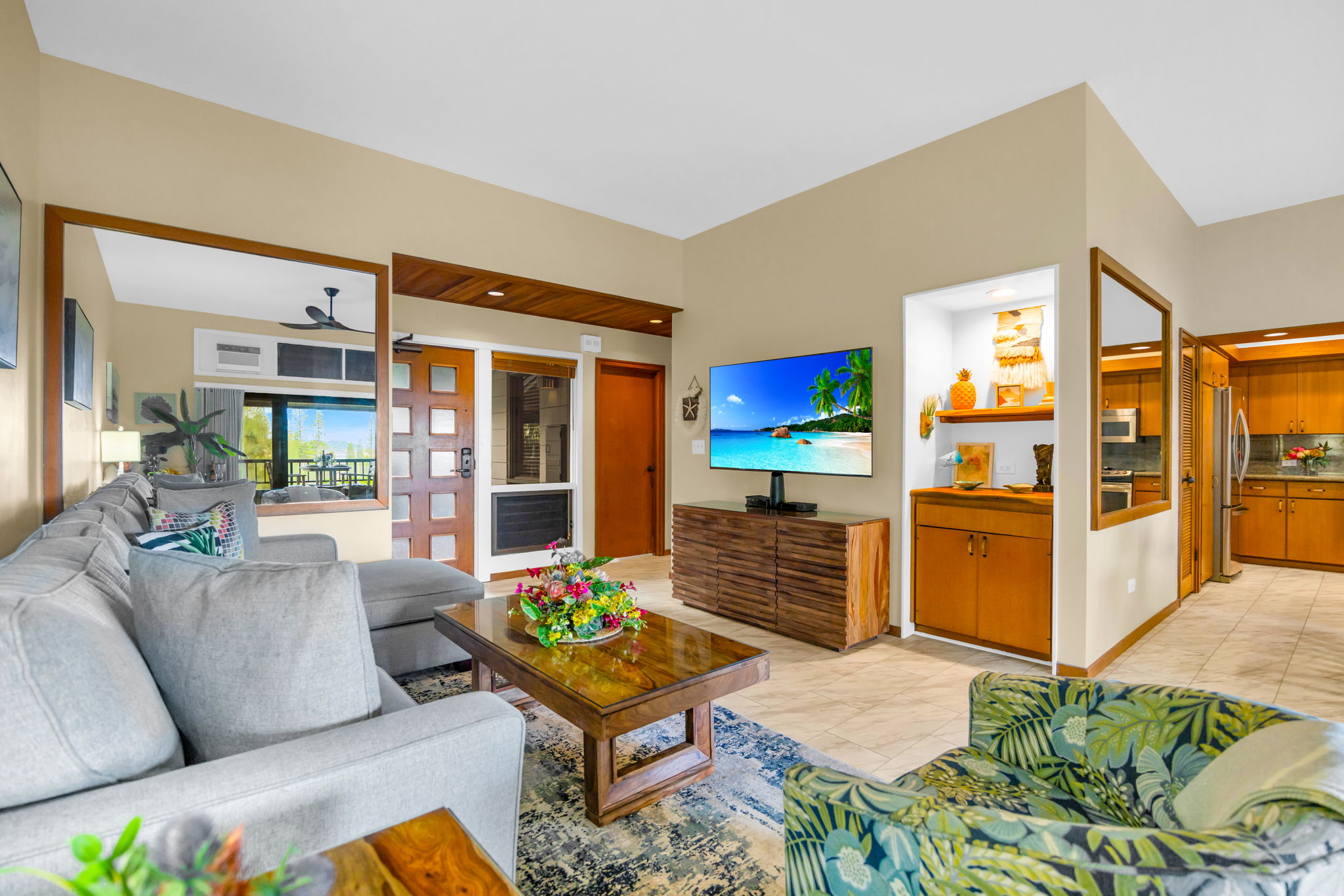 Open-concept layout blends lounging, dining, and fresh air on the lanai.