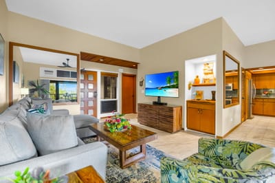Open-concept layout blends lounging, dining, and fresh air on the lanai.