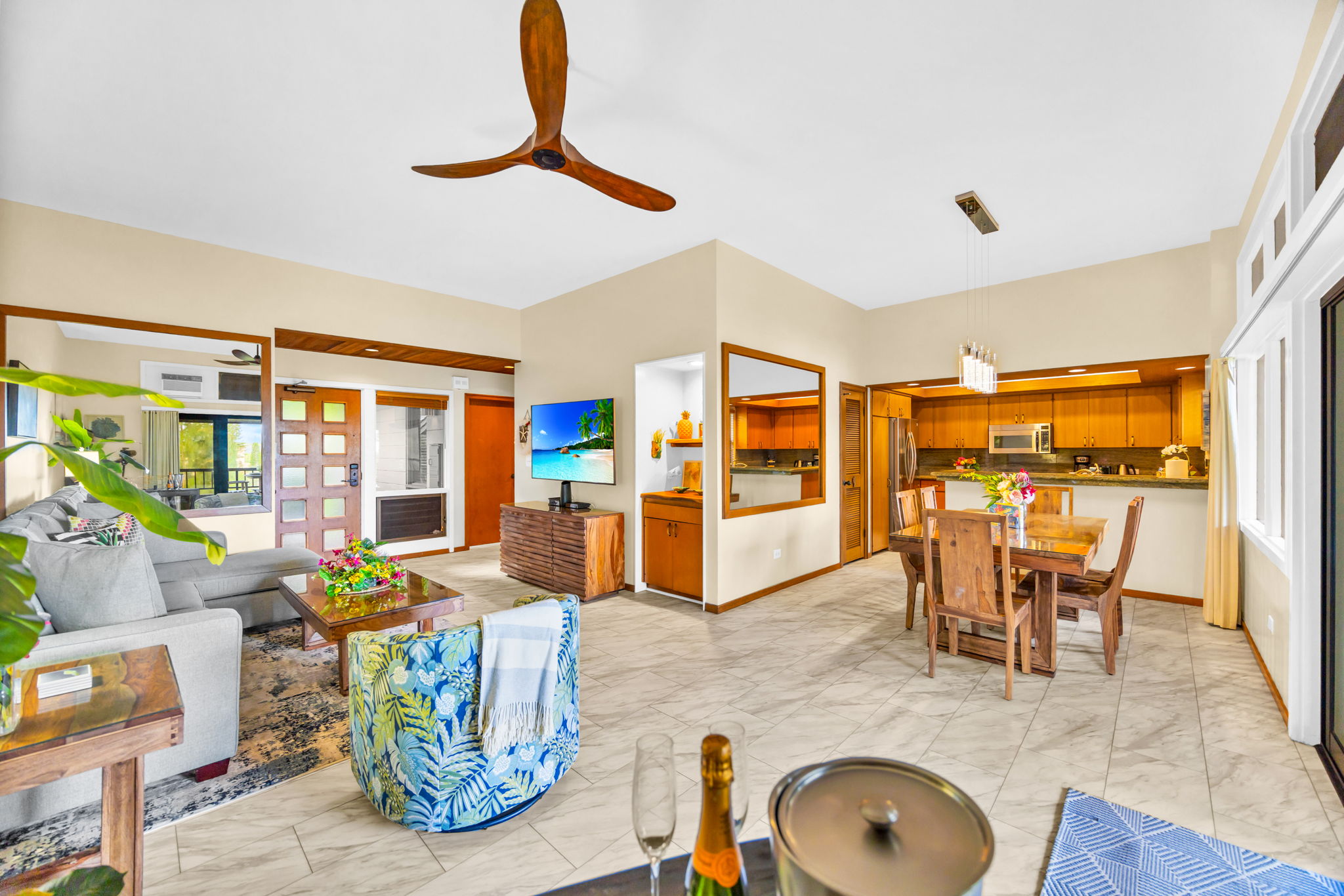 Living space flows easily to kitchen and dining—perfect for laid-back evenings.