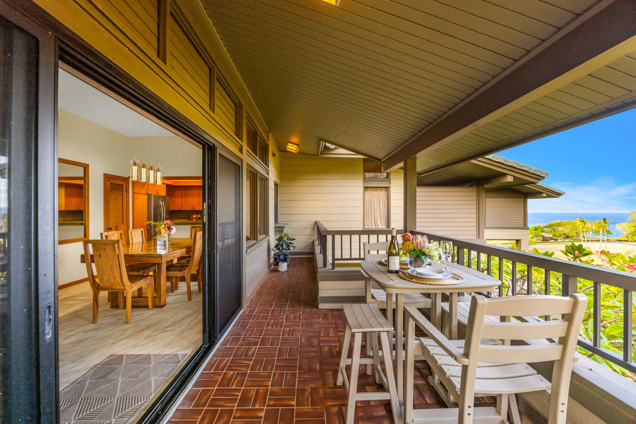 Step out from the living area onto your ocean-view lanai retreat.