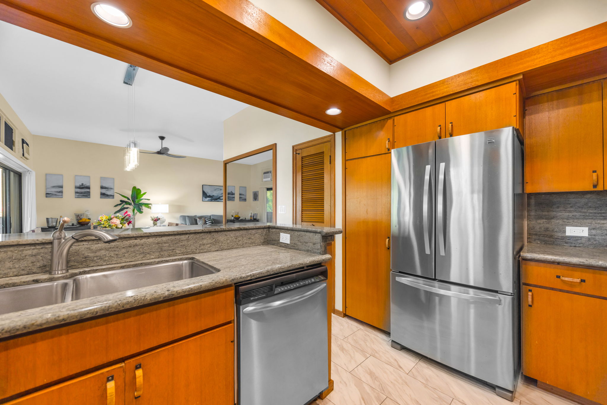 Generous counter space and large fridge in your full kitchen.