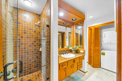Granite vanity and full-size mirror in your second bathroom.
