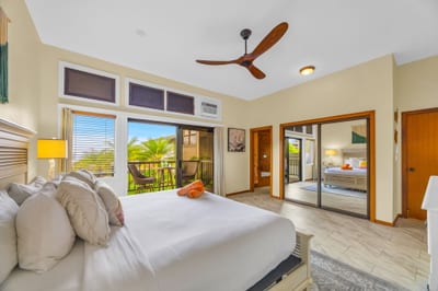 Rest easy in your spacious Master bedroom with King bed and lanai access.