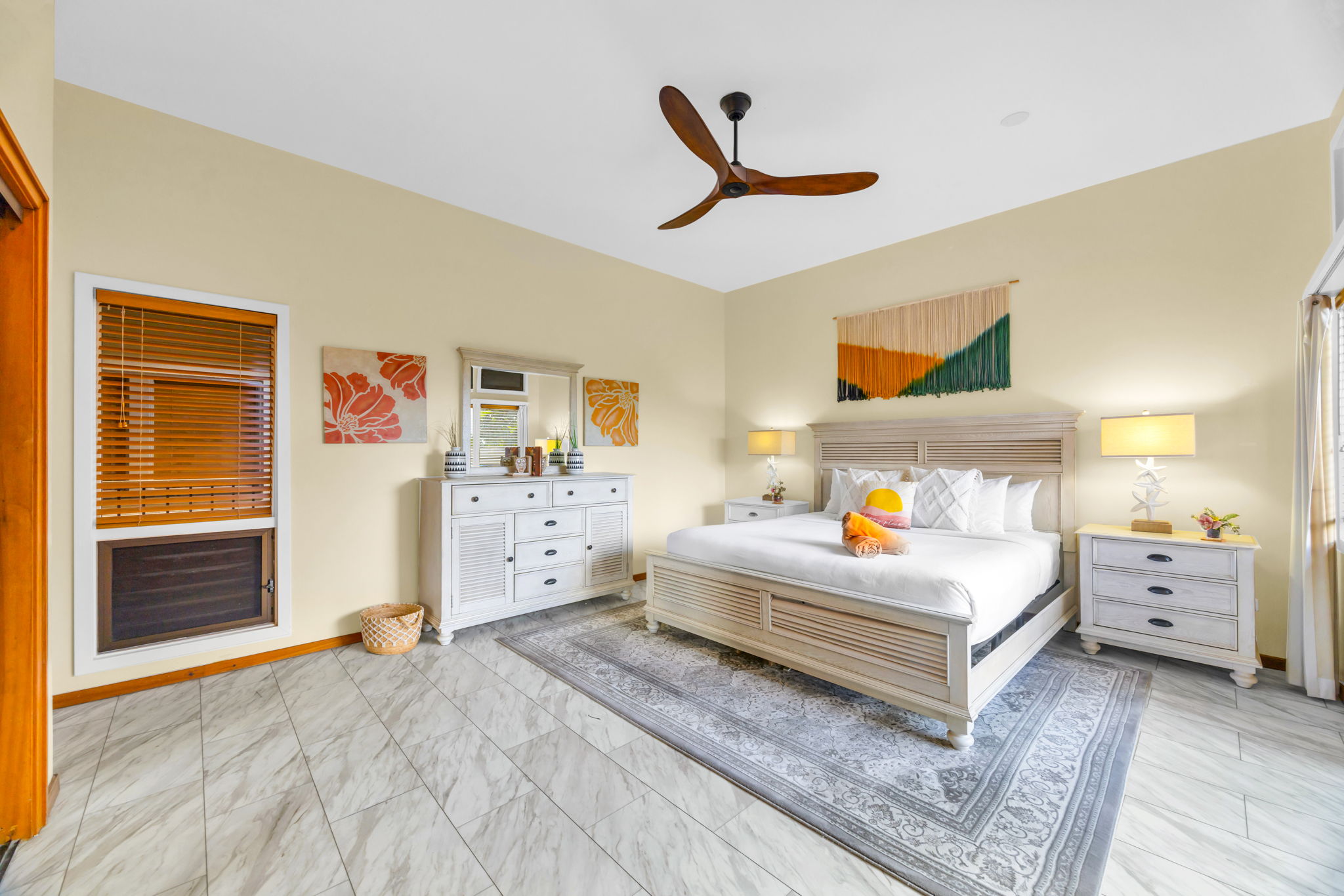 Open, airy bedroom with King bed and private ensuite.