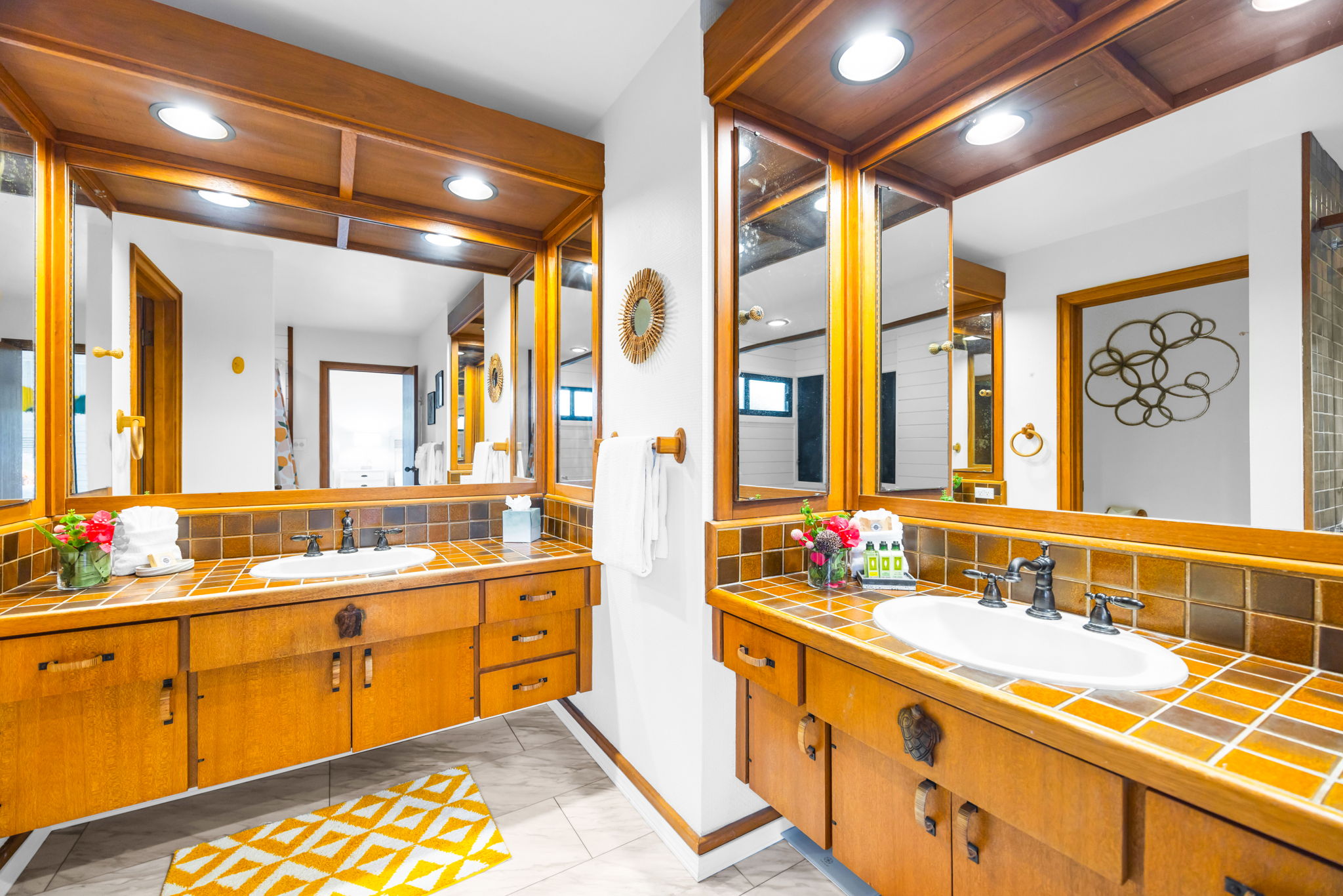 Granite counters, dual sinks, and wood finishes add a luxe feel to your primary bath.