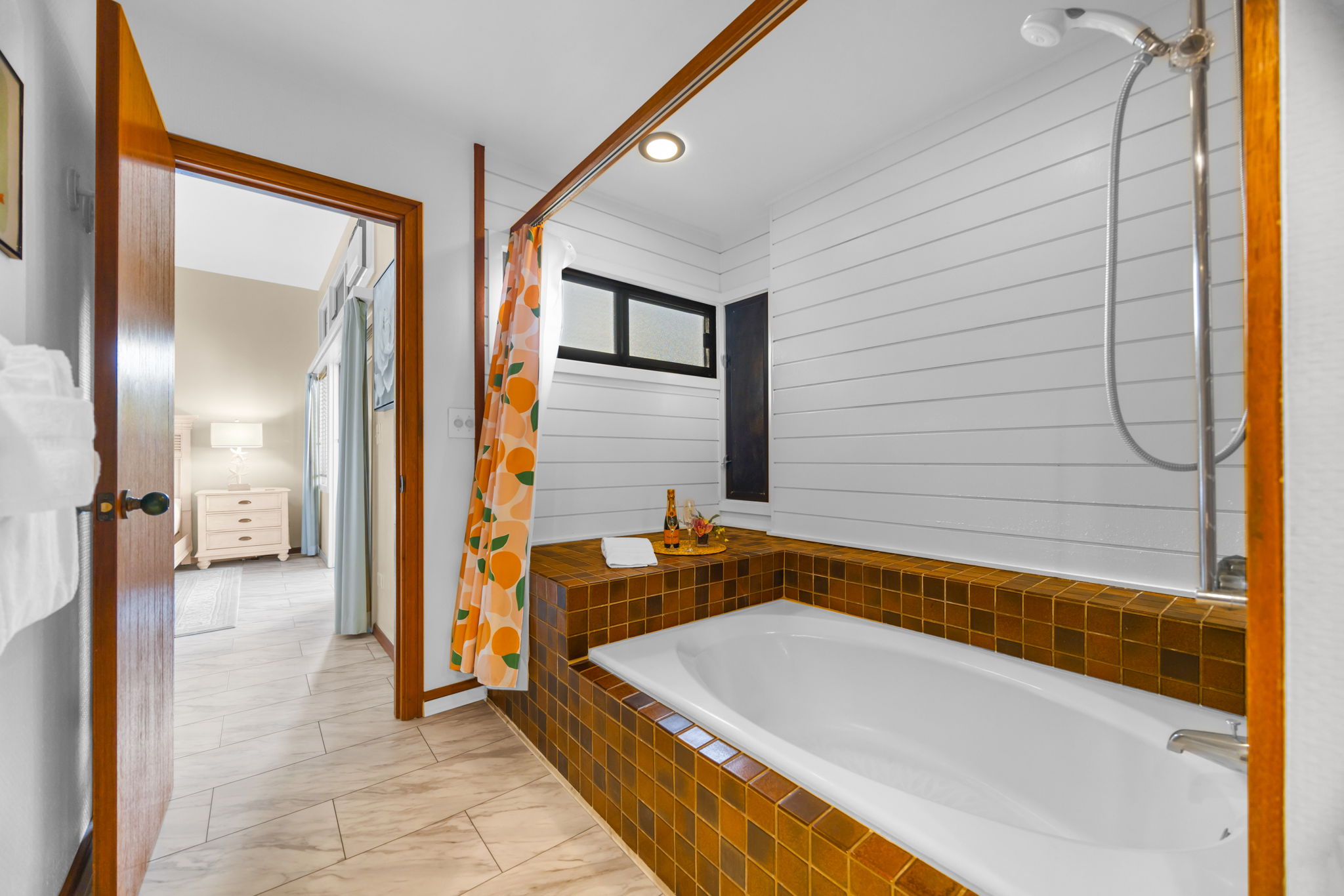 Deep soaking tub for unwinding after a beach day.