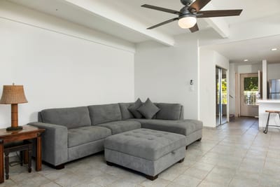 A place to unwind, reconnect, and savor ocean light—this living area pairs softness with island simplicity and space