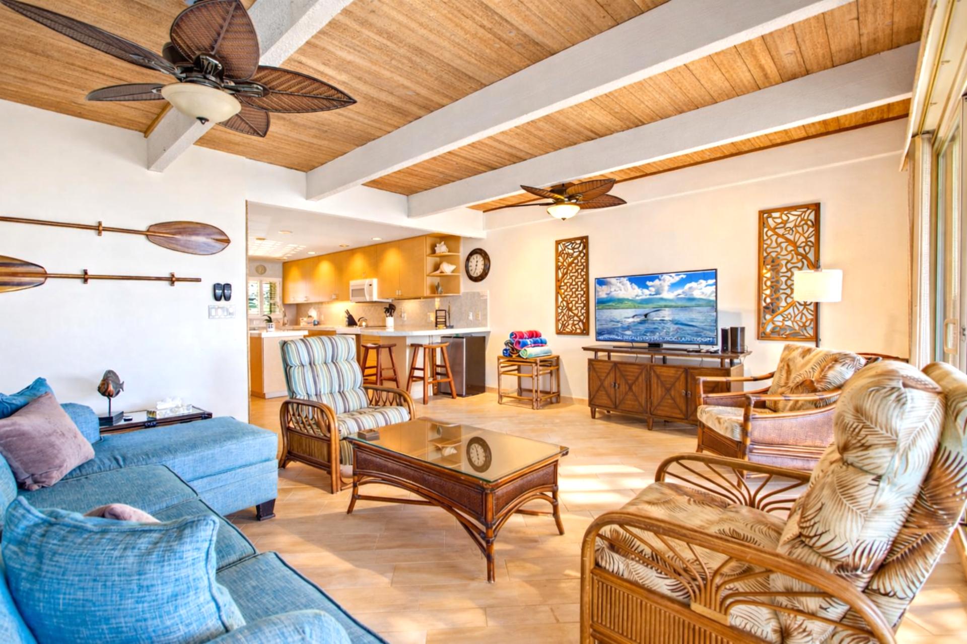 From your sofa, watch waves roll in through expansive glass doors that connect indoor comfort with fresh ocean air.