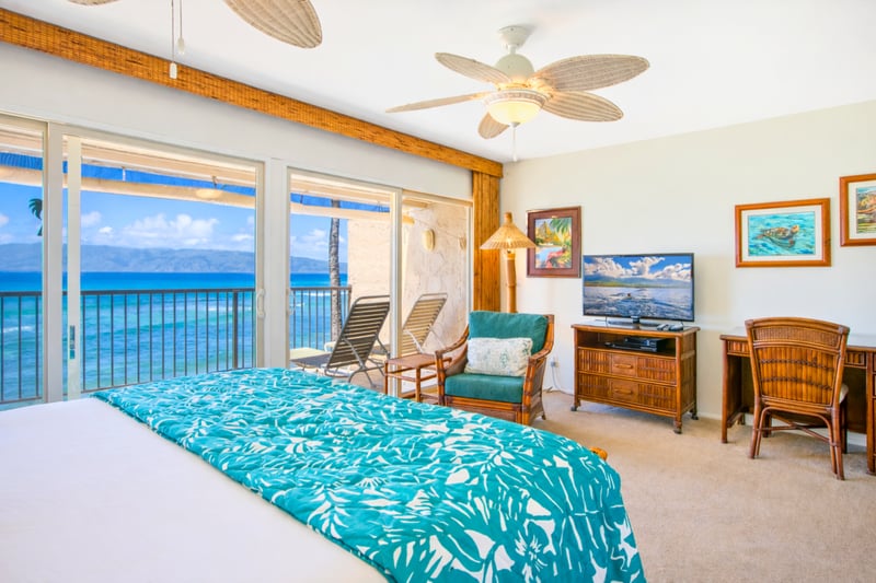Ocean views greet you from your bedroom, where sliding glass doors open directly to your spacious lanai.