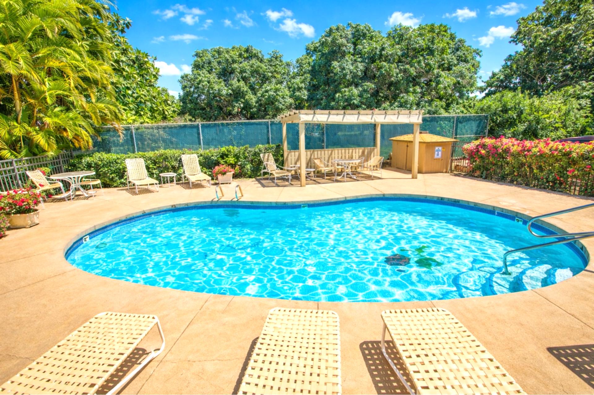 Cool off in your oceanfront community pool, surrounded by tropical landscaping and just steps from the shoreline.