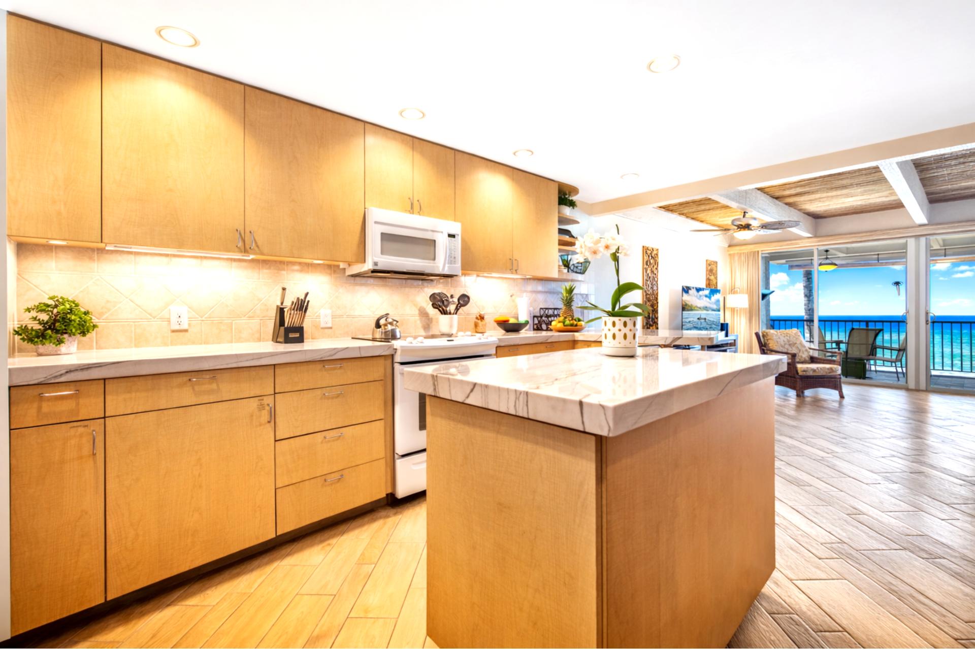 Prepare island favorites in your bright kitchen, complete with full size appliances and ample cabinetry for extended stays.