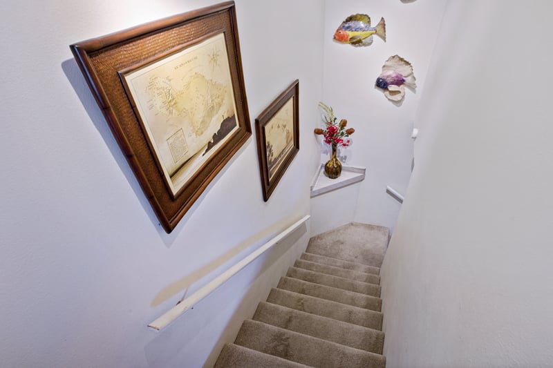 A convenient interior staircase leads between levels, adding separation and privacy within your vacation retreat.