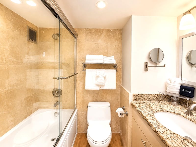 Refresh in the spacious bathroom with a beautifully tiled shower and tub combo MAH-1002