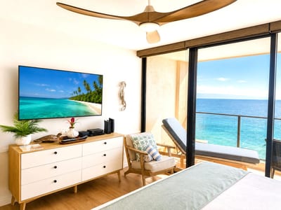 Relax with your favorite movie and the sound of gentle waves just outside your lanai
