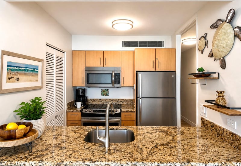 Prepare island inspired meals in the fully equipped kitchen with modern appliances and granite countertops MAH-1002