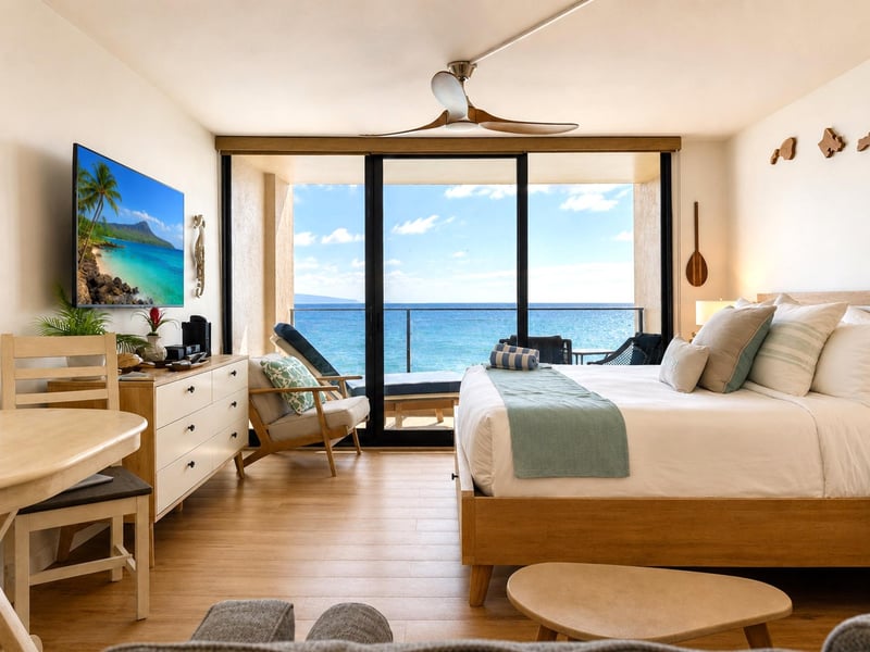 The bright open living area offers comfortable seating and stunning oceanfront views MAH-1002