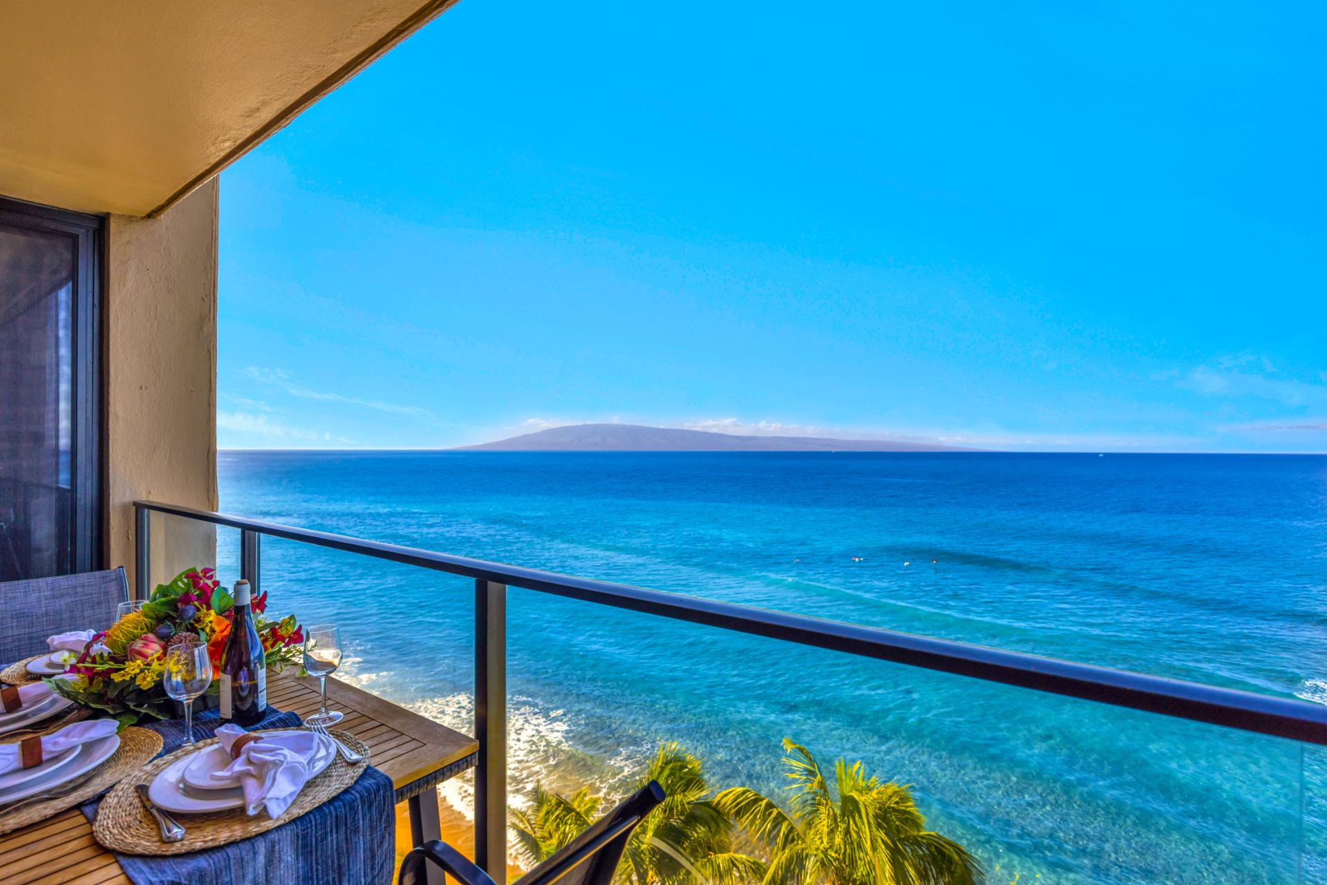 Stretch out in the living area with plush seating and a wall of glass that keeps the ocean front and center.