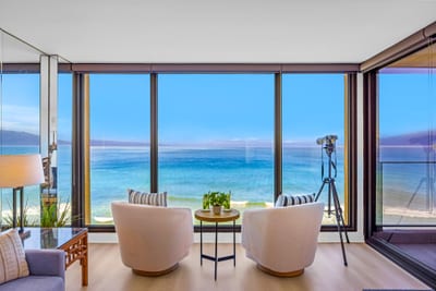 Share breakfast on the lanai table while trade winds roll in and the ocean stretches wide below.