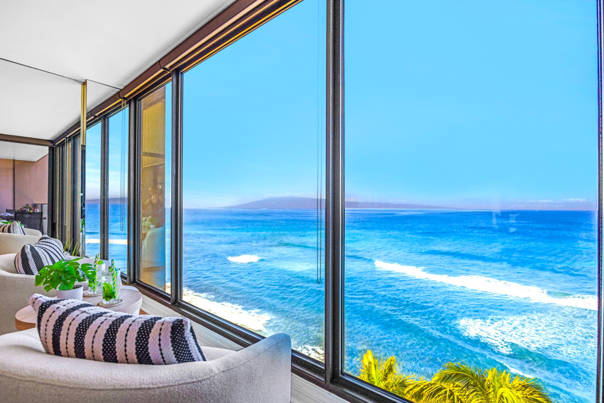 A cozy seating corner lets you sip your morning coffee and watch the waves, without ever leaving the living area.