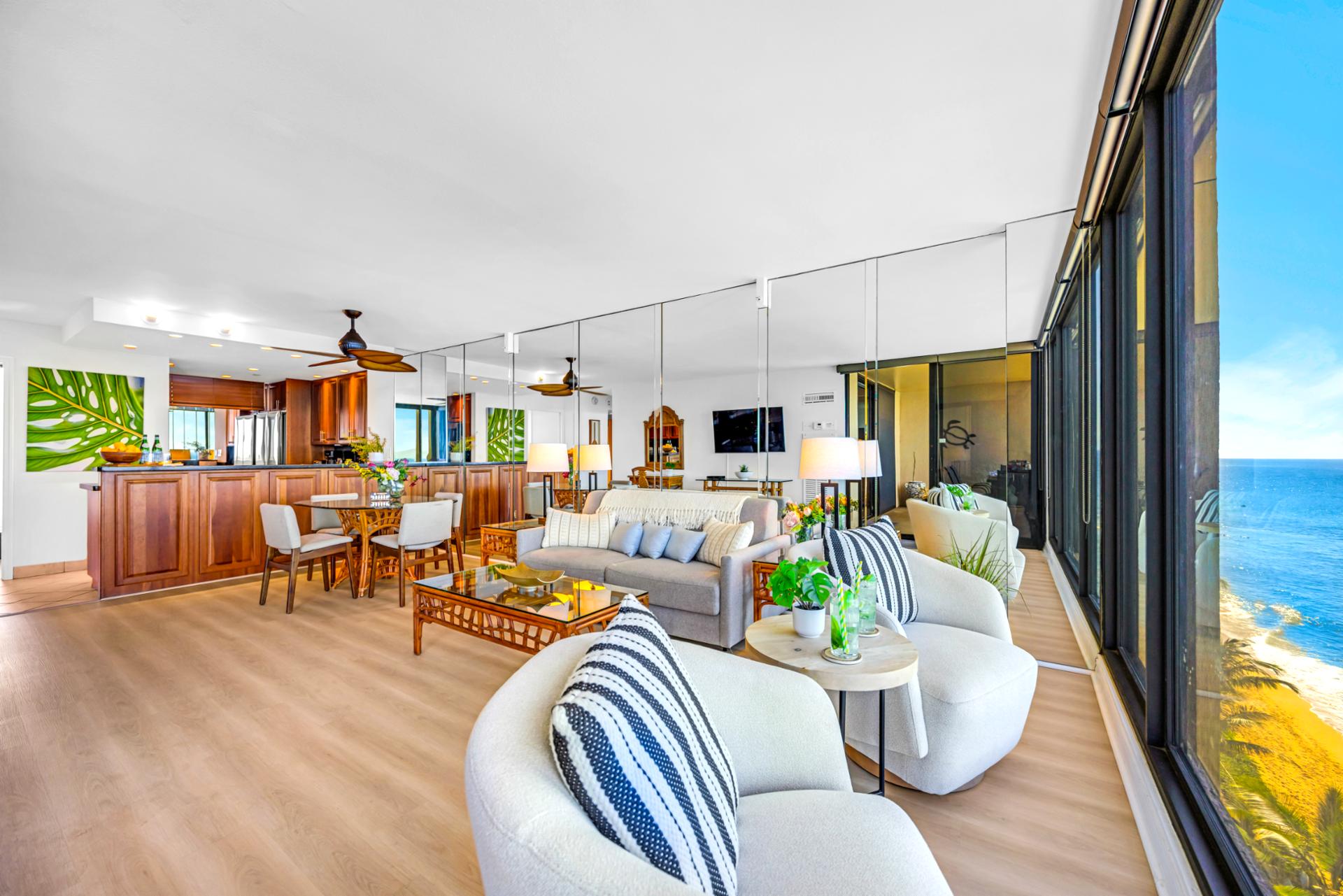 Sink into the sofa after a swim, with wide open ocean views and natural light pouring through the windows.