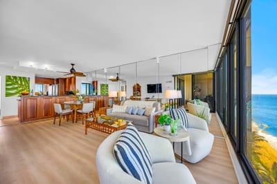 Sink into the sofa after a swim, with wide open ocean views and natural light pouring through the windows.