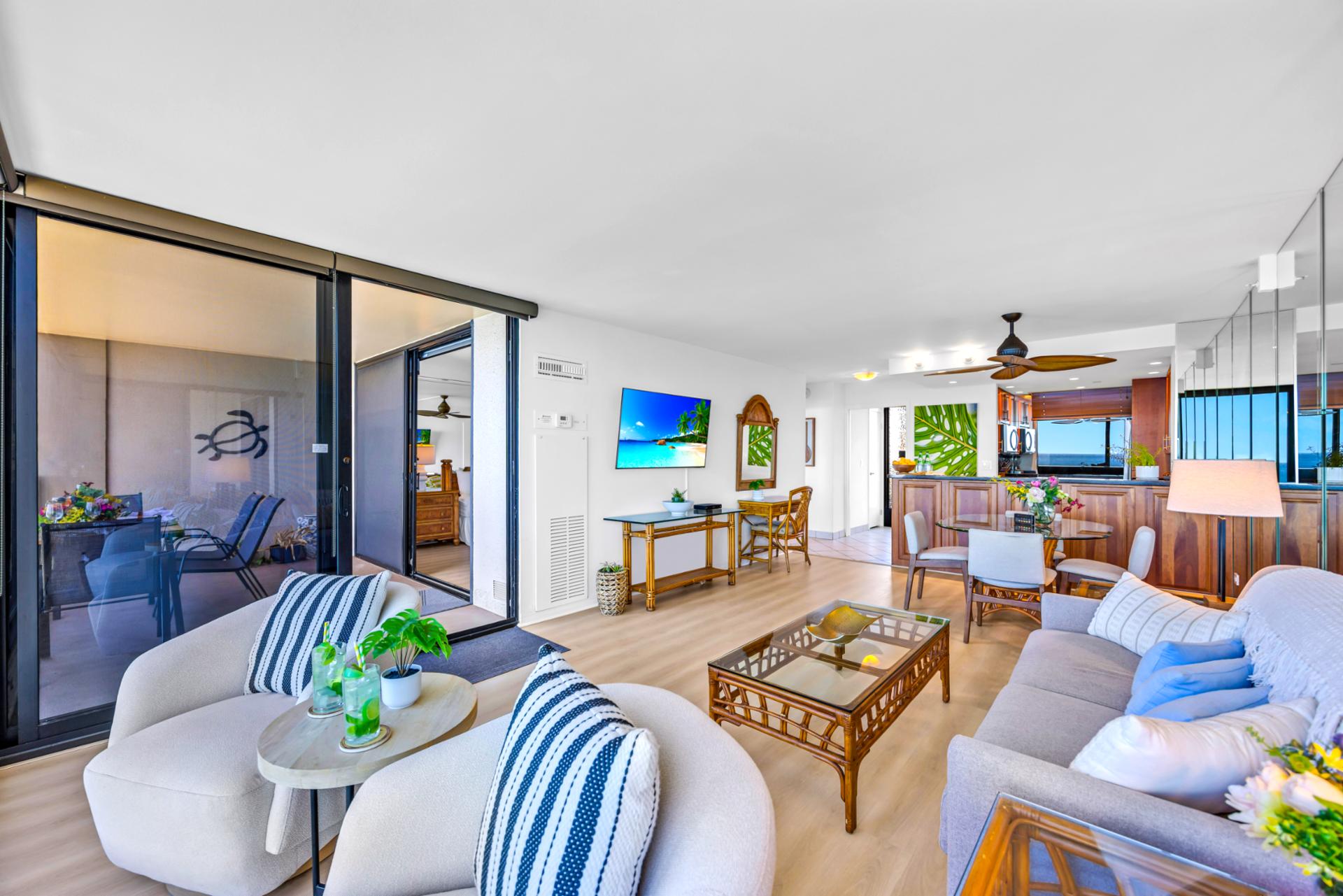 This living room keeps everything simple and scenic, comfortable seating, airy layout, and that ocean backdrop.