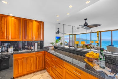 The kitchen layout keeps you connected to the living space, so conversation flows while you prep meals.
