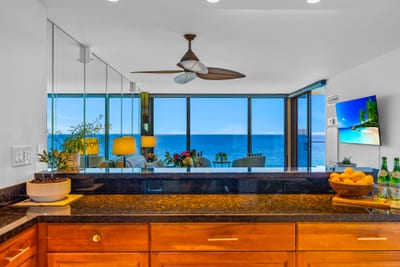 Cook with ease in your updated kitchen with warm wood cabinetry and generous counter space for island snacks.