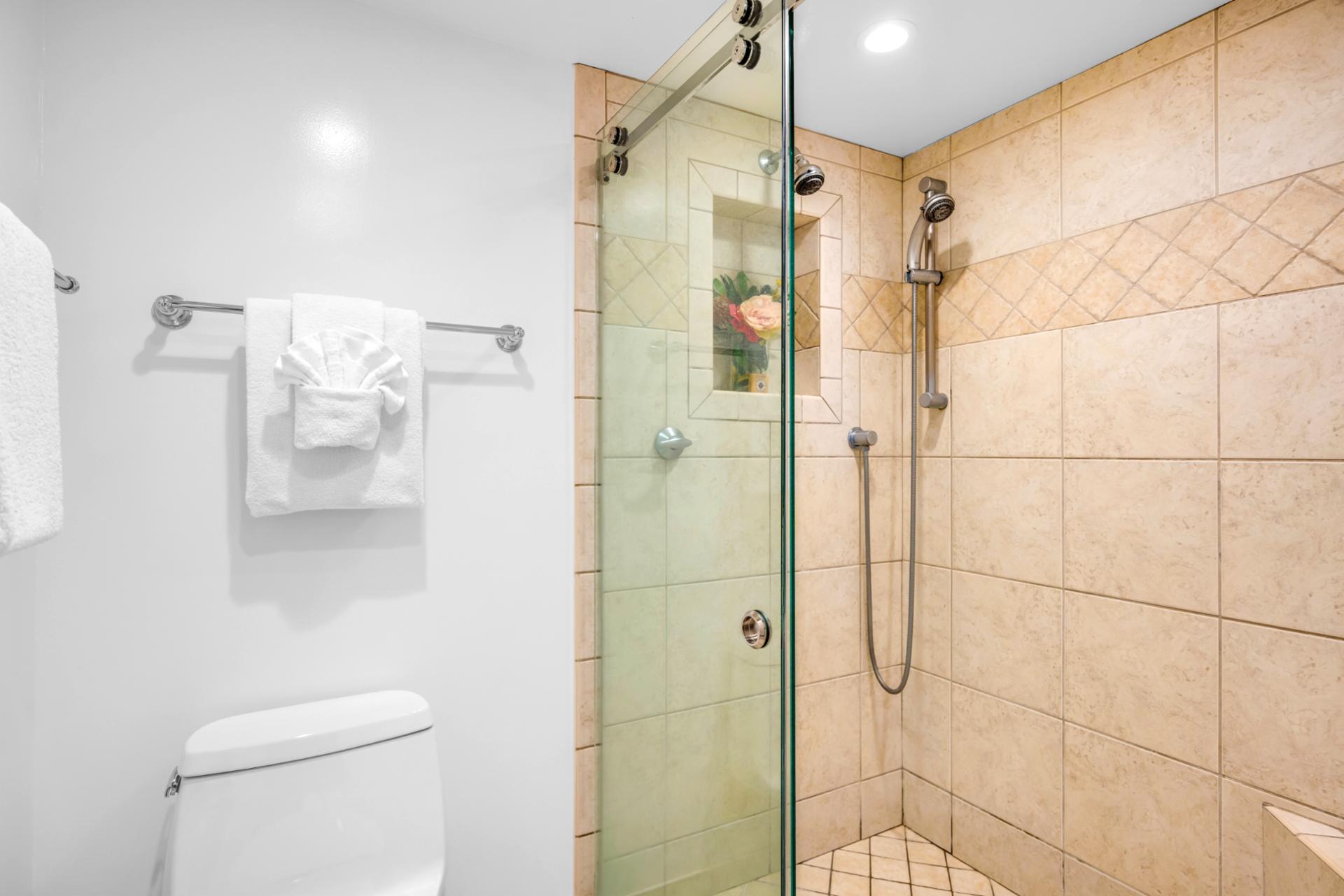Refresh in your updated bath with a walk in shower and clean finishes, stocked with LOccitane amenities.