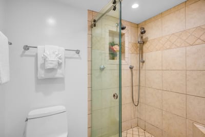 Refresh in your updated bath with a walk in shower and clean finishes, stocked with LOccitane amenities.