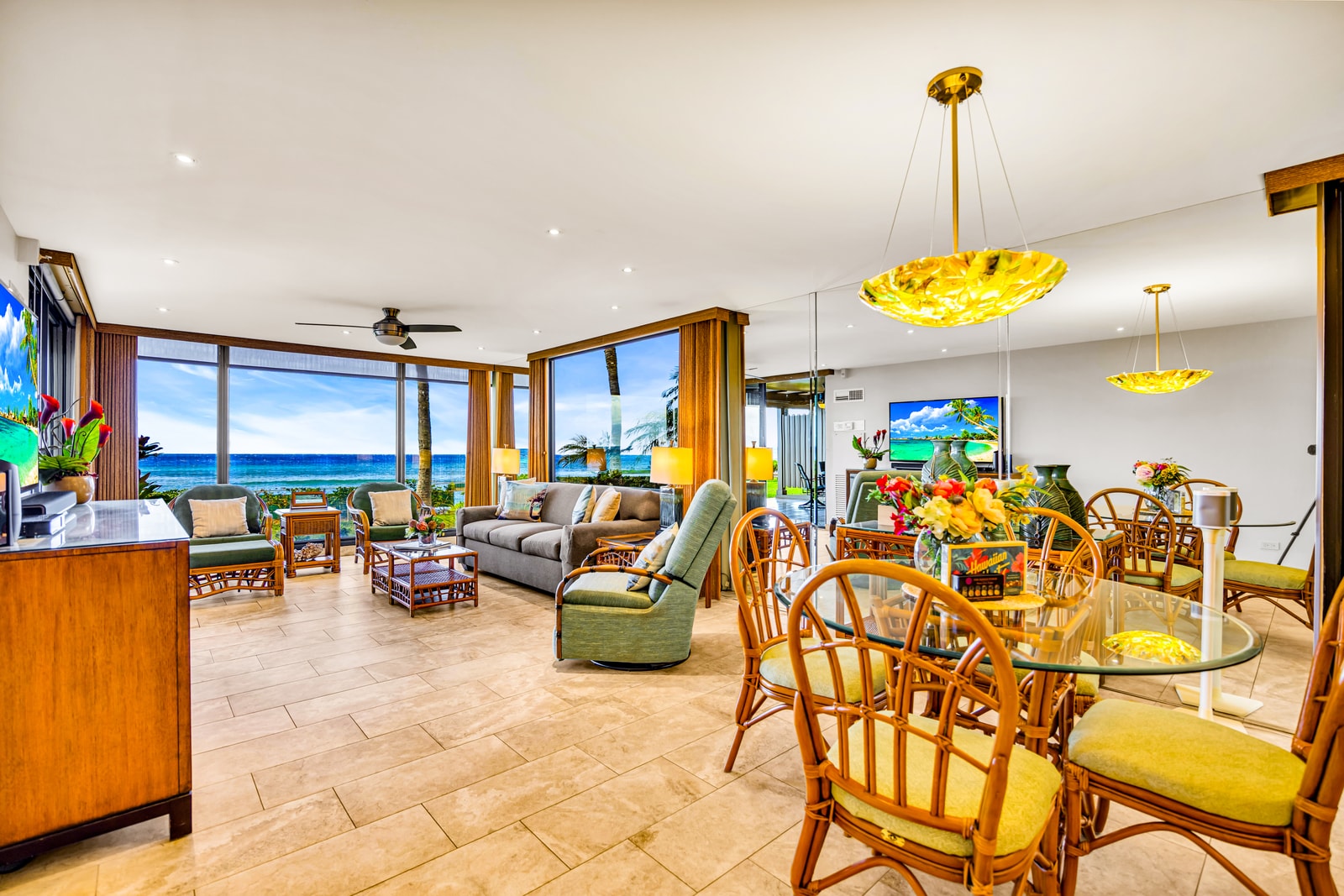 Easy mealtime setup with seating for four, ocean light, and open access to the kitchen. MAH-109