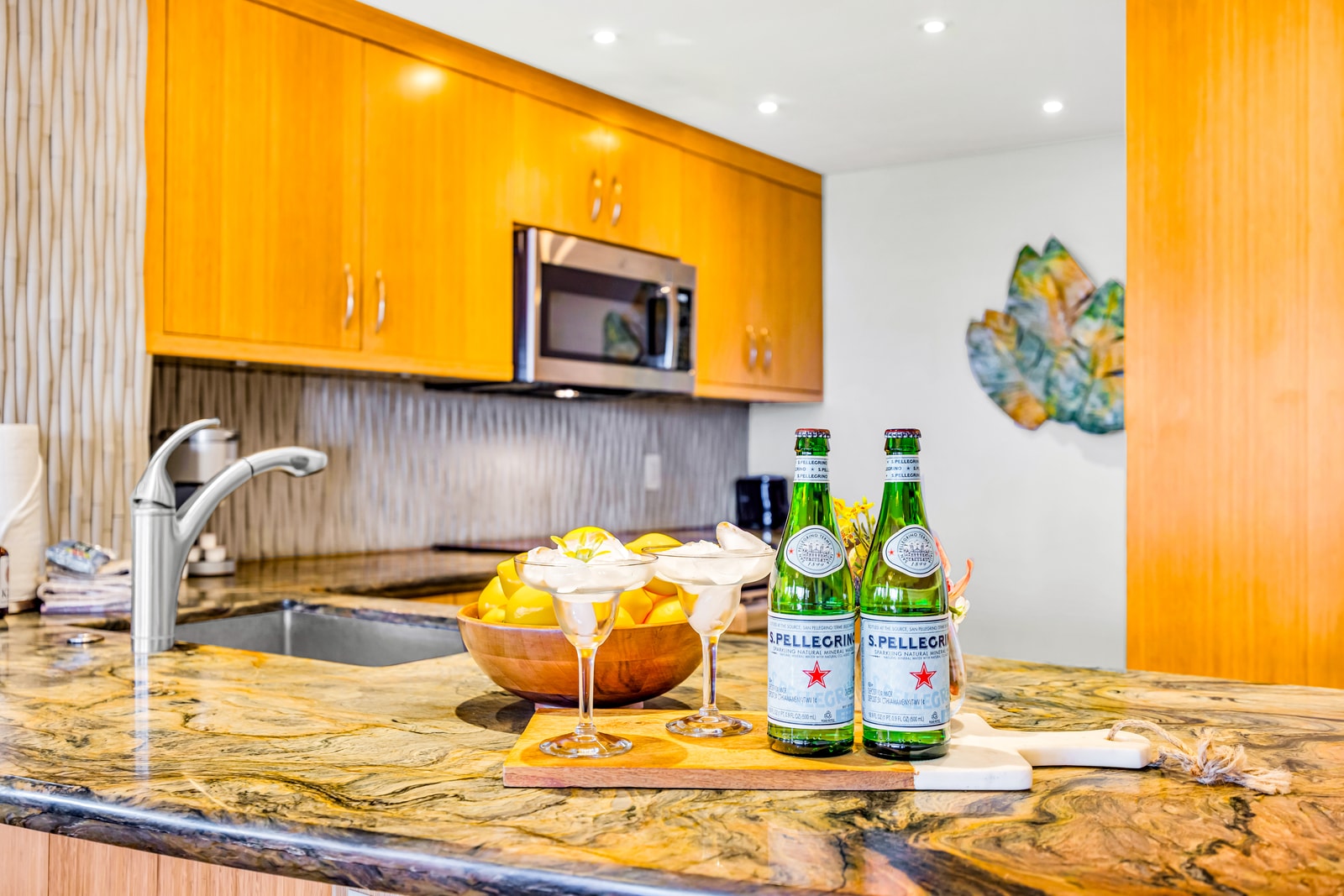 Fully equipped kitchen with granite counters and breakfast bar makes meal prep a breeze. MAH-109