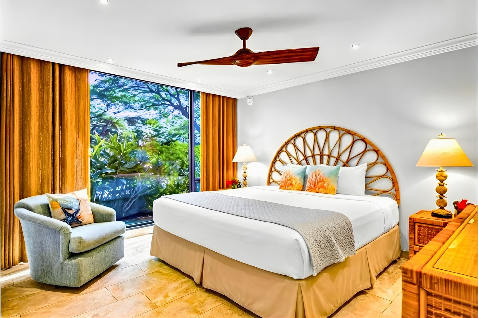 You second bedroom features a stunning King bed, TV, and tropical accents for a restful night. MAH-109