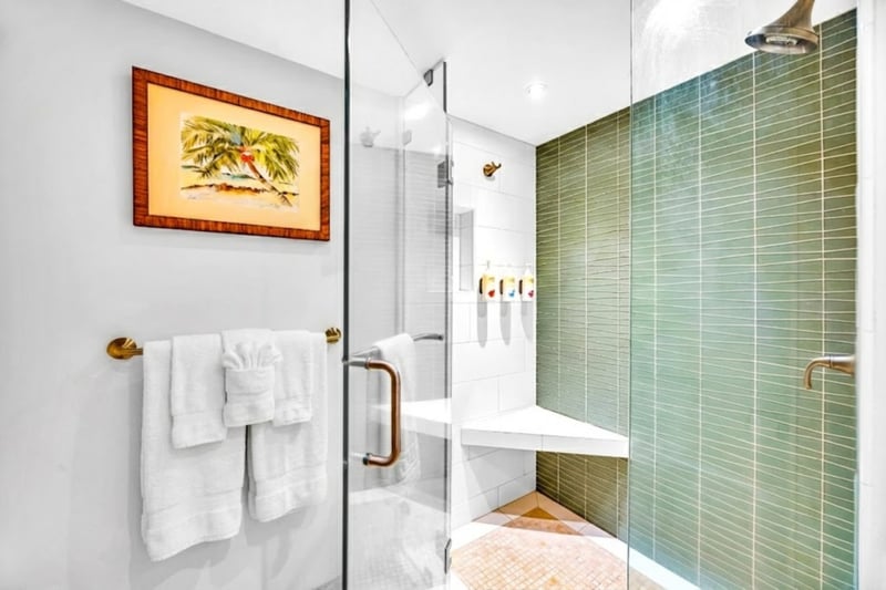 Your luxurious walk-in shower and corner seat  are perfect for your at-home spa day. Especially with the complimentary luxury amenities from L'Occitane