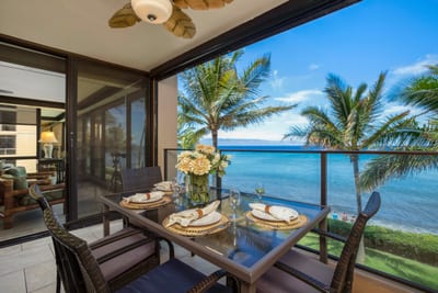 This lanai is where coffee meets coconut-scented dreams, and breakfast lingers long with the ocean as your company MAH-301