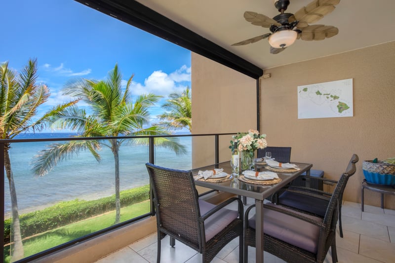 Glass railings frame a view so divine, it feels like you’re dining inside a live-action painting of paradise     MAH-301