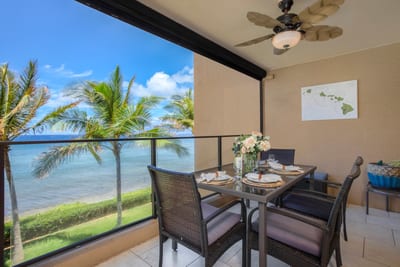 Glass railings frame a view so divine, it feels like you’re dining inside a live-action painting of paradise MAH-301