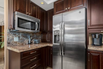 Granite countertops swirl like marble fudge, begging to cradle charcuterie boards and lazy brunch dream MAH-301
