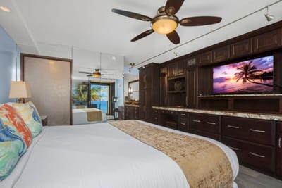 Pillows pop with parrots and pineapples, plotting your next piña colada from the cozy safety of your bed MAH-301