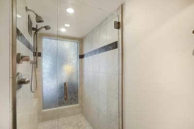 This shower isn’t just a rinse station—it’s a misty sanctuary, crowned in chrome and tiled in quiet aquatic poetry MAH-301