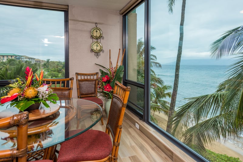 Sip your morning coffee beside swaying palms and turquoise waves, all without leaving your sun-drenched seat