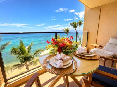 Morning coffee and breathtaking beachfront views from your private lanai