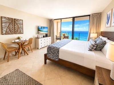 Oceanfront king bed with spectacular views from sunrise to sunset