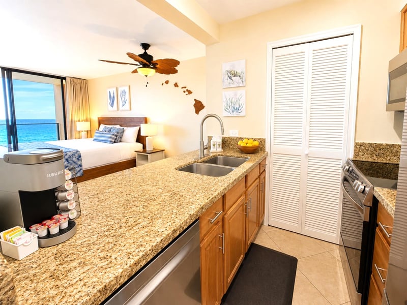 Modern kitchen with granite countertops and oceanfront studio layout MAH-502