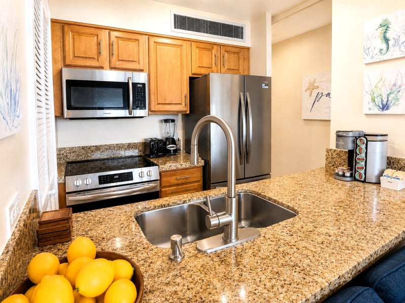 The kitchen features a spacious countertop and a two basin sink for added convenience MAH-502